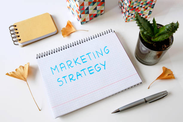 istock marketing strategy written in a notebook 973470578