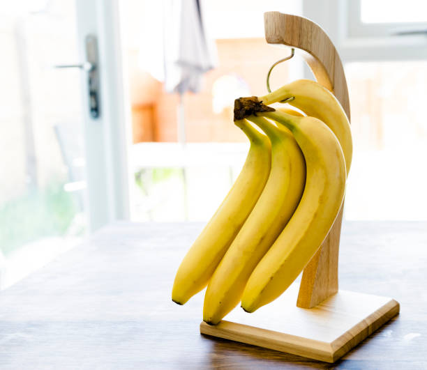 istock Bunch of Hanging Bananas 973485156