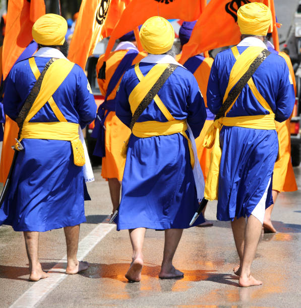 istock Sikh soldiers in barefoot uniforms 973488006