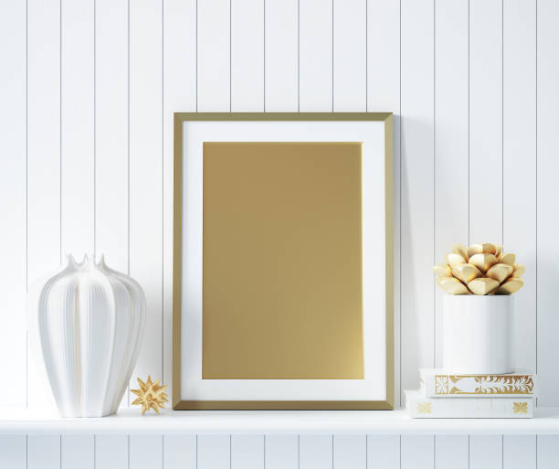 istock Mock up golden poster frame in interior background with decor 973488104