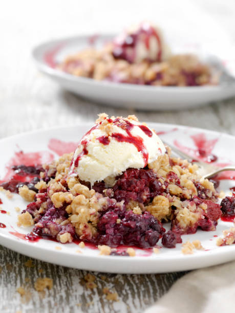 istock Triple Berry Crisp with Vanilla Ice Cream 973488690