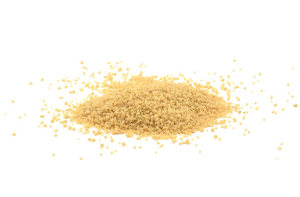 istock Pile of raw organic couscous 973498518
