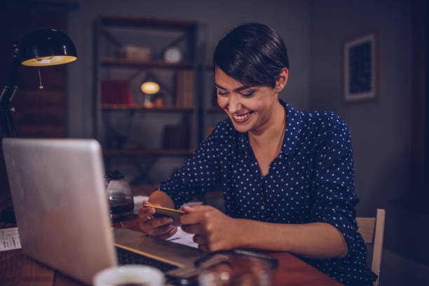 istock Beautiful woman using phone 973501874