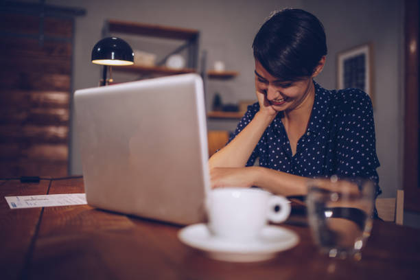 istock Woman working late 973501936