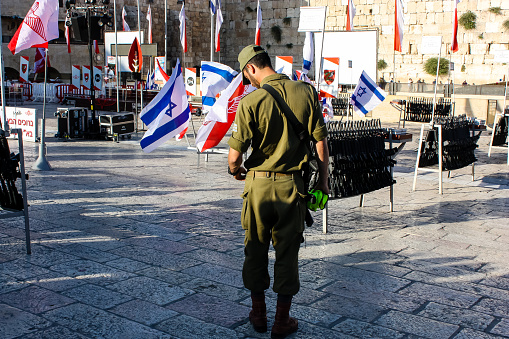 Jerusalem Israel May 31, 2018 View of unknowns people and soldiers attending an army ceremony on the Western Wall Square in the old city of Jerusalem in the evening