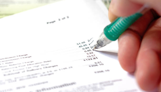 istock Working on home financial  accounts a utility bill 973512196