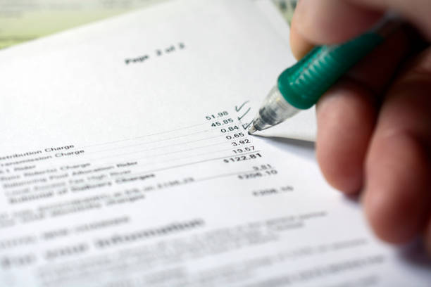 istock Working on home financial  accounts a utility bill 973512226
