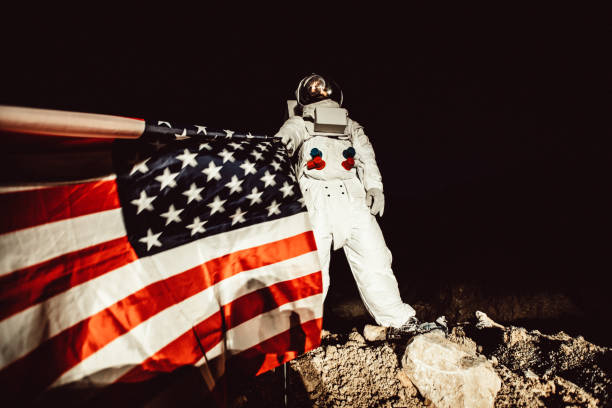 istock Proud Astronaut With American Flag On Mars 973518596