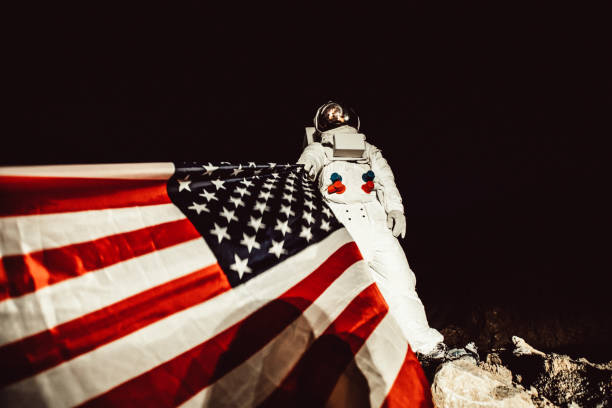 istock Proud Astronaut With American Flag 973518982