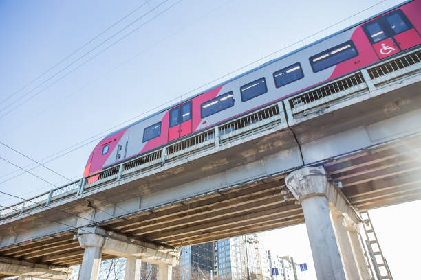 istock train moves on the bridge at sunset 973531726