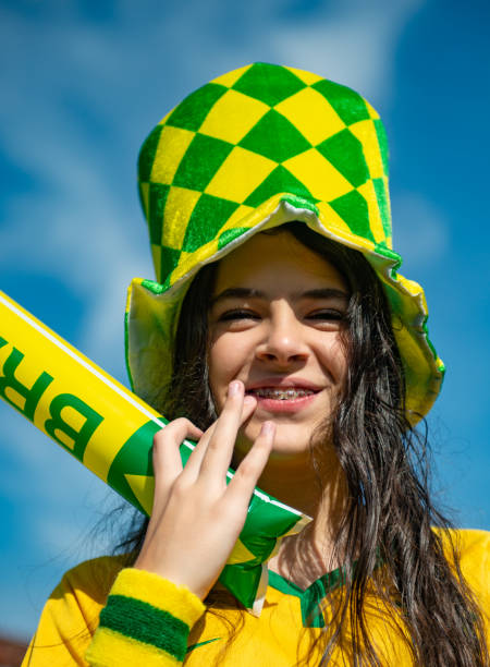 istock Brazilian fan playing with baton 973531804
