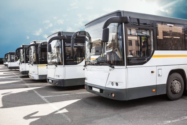 istock tourist buses on parking 973531870