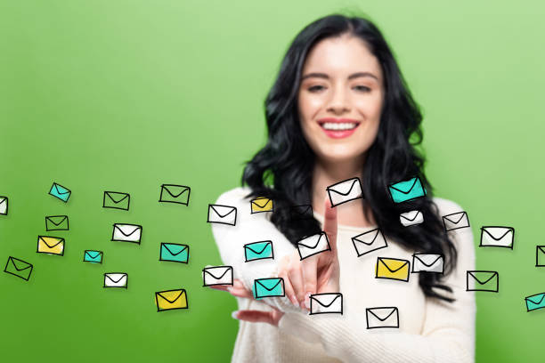 istock Emails with young woman 973534354