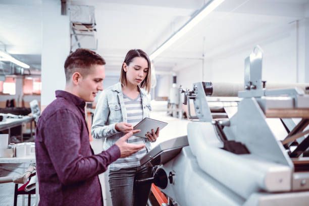 istock CEO Wondering If Textile Machine Is Properly Repaired 973534912