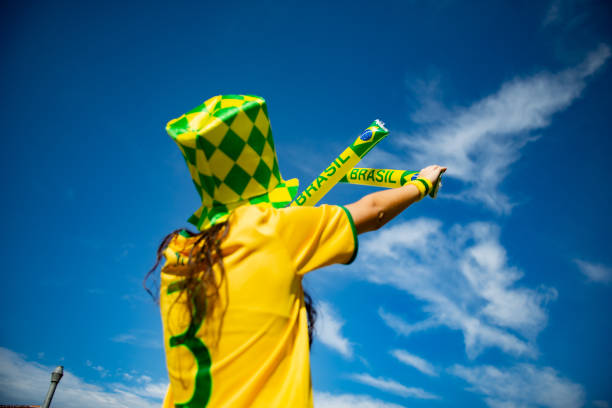 istock Brazilian fan playing with baton 973535154