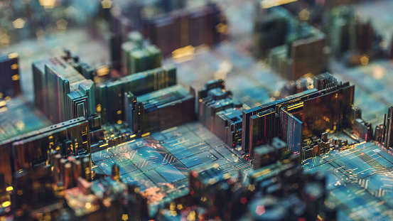 Futuristic circuit board like city at night.