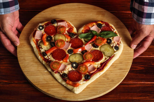 istock Heart shapes pizza 973547438