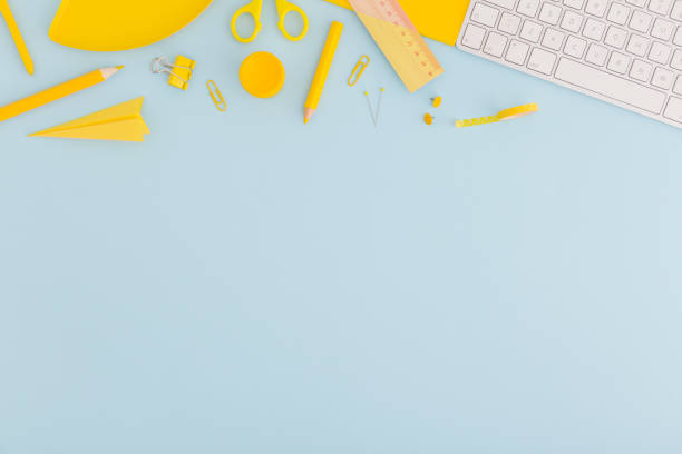 istock Desk with school supplies. 973565148