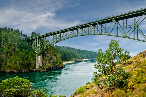 Deception Pass Bridge, built in 1934, is a two-lane bridges on State Route 20 between Whidbey and Fidalgo Islands in Washington State, USA. It was a Washington State, Highways project, partially built by young workers from the depression era Civilian Conservation Corps.