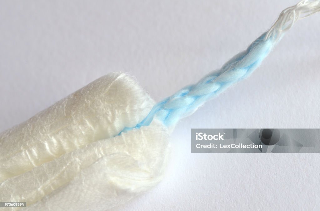 macro shot of a tampon string and core Detailed view of tampon braid and core Bandage Stock Photo