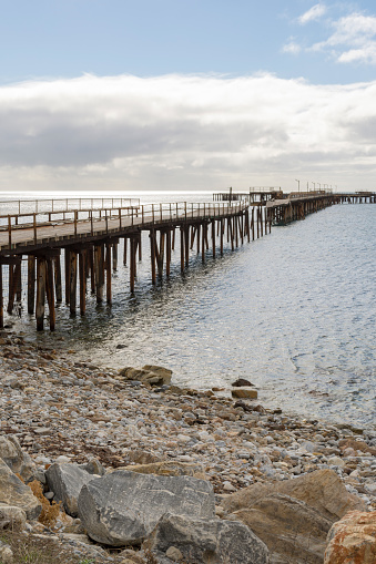 Rapid Bay, South Australia, Australia - May 5, 2018: The old decommissioned and dilapidated wooden jetty. Part of the Fleurieu Peninsula.