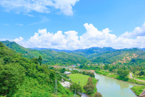 istock river in dam countryside for water Power generation. top view with copy space add text 973640318