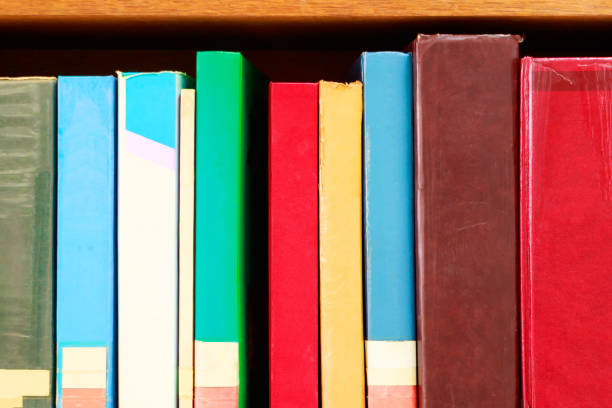 istock old book in school library bookshelf education learning concept with copy space add text 973640878