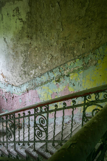 istock Staircase in an abandoned house 973667130