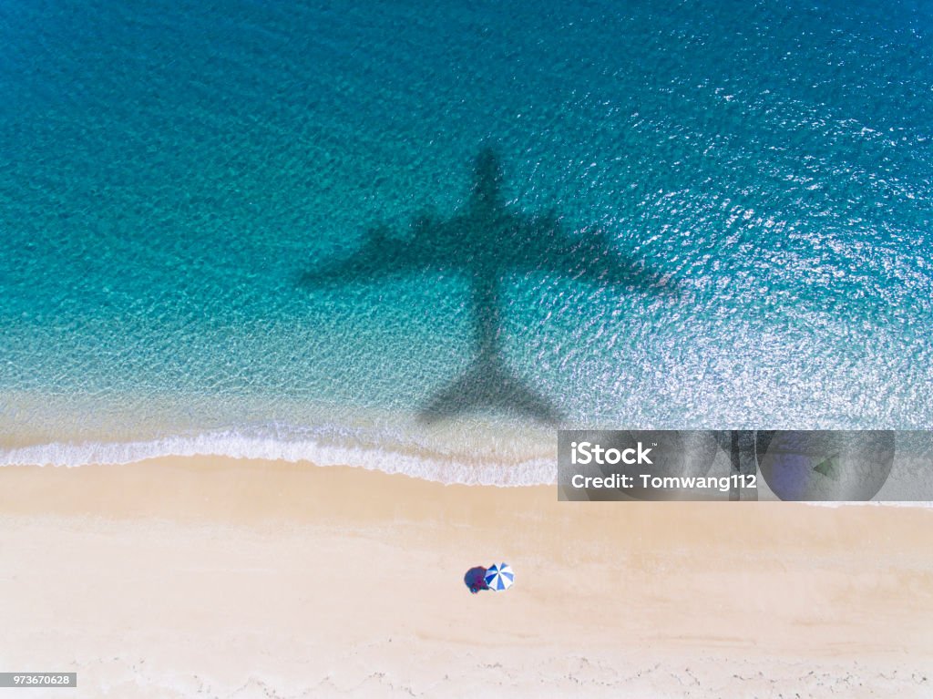 Aerial view of Tropical beach with summer vacation concept Airplane Stock Photo