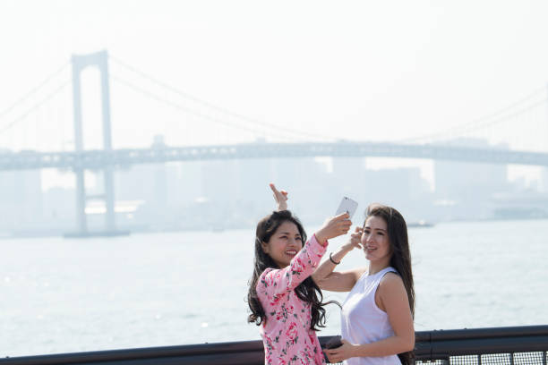 istock Commemorative photo by the seaside. 973682668