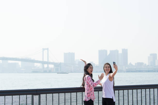 istock Commemorative photo by the seaside. 973682680