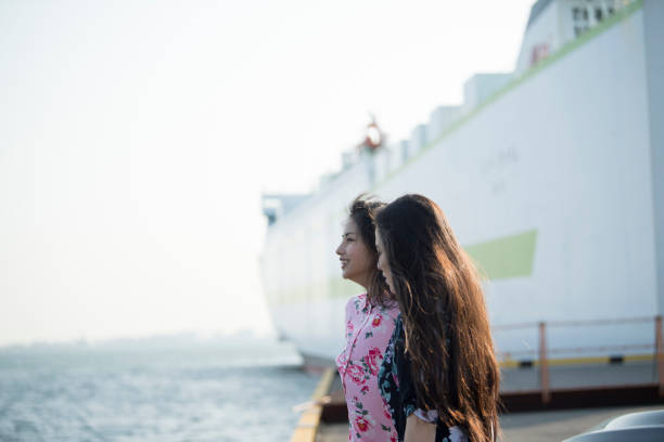 istock Two women looking at the sea. 973682730