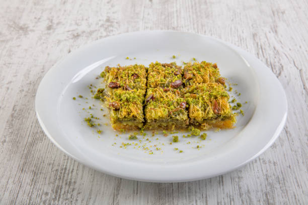 istock Kadayif,turkish dessert kadayif with walnut 973685976