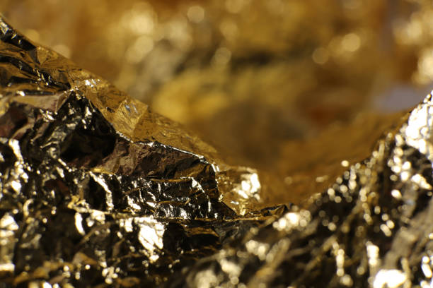 istock Golden Mountain Landscape Foil Composition. Macro Closeup. 973686018