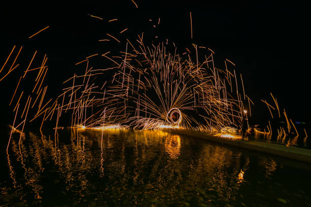 istock Fire show amazing at night 973696590