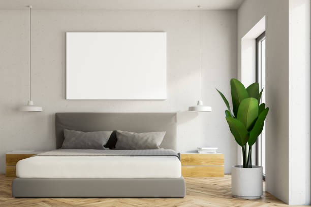 istock White bedroom interior, wooden floor, poster 973704652