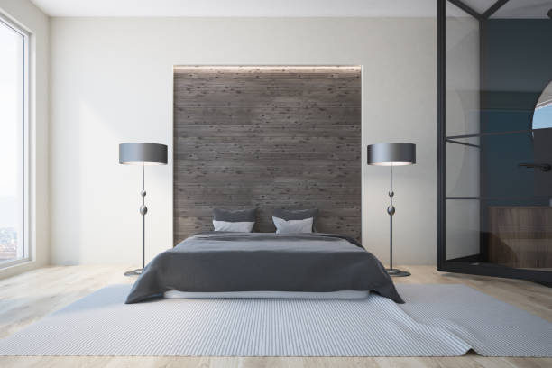 istock White and gray bedroom, fireplace 973704844