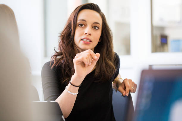 istock Business people discussing work in a meeting 973712440
