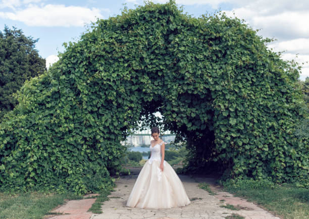 istock A summer walk with the bride in the park 973718750