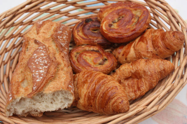 istock Croissants - Viennoiserie Buns with raisins  Breakfast 973722672