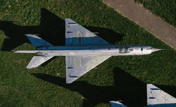 istock Aerial drone view on old jet fighters. 973735760
