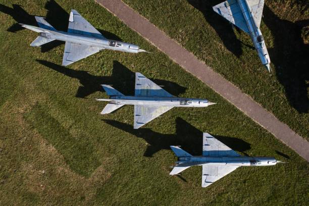 istock Aerial drone view on old jet fighters. 973735786