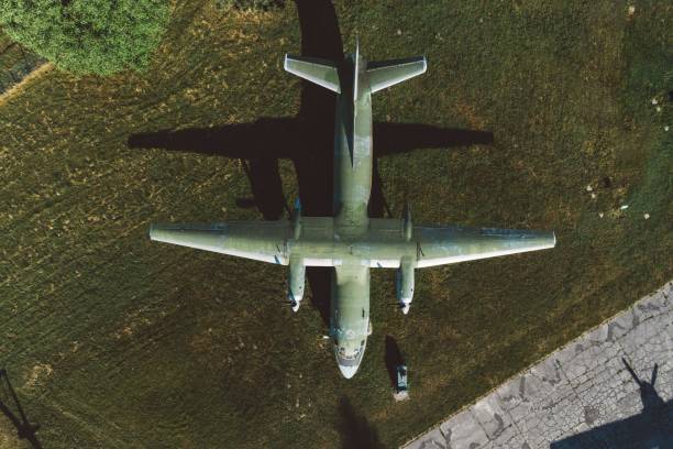 istock Above drone view on military propeller transport aircraft 973735806