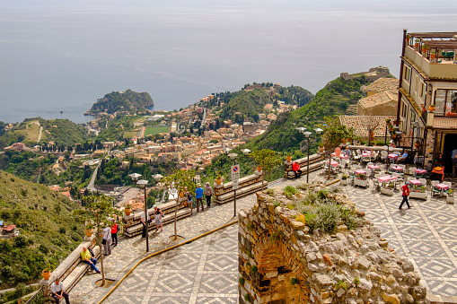 Castelmola is a small and well-preserved village located on a rocky outcrop overlooking the Ionian Sea. From the town square tourists enjoy a beautiful panorama on the Ionian coast and the city of Taormina.