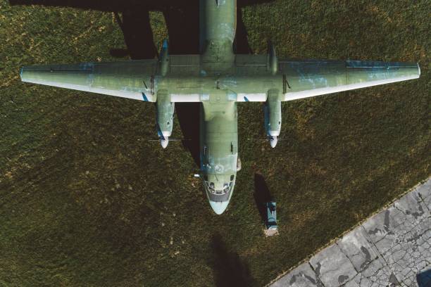istock Above drone view on military propeller transport aircraft 973735832