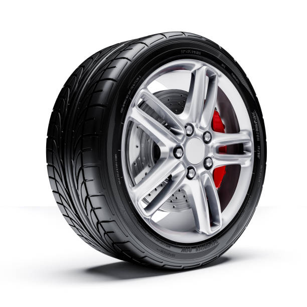istock 3d car tires and alloy wheels 973736234