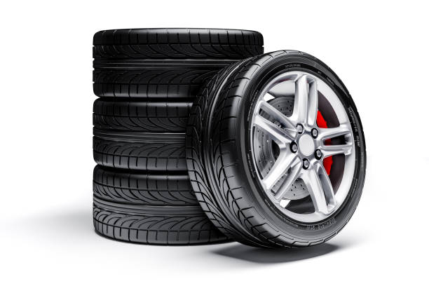 istock 3d car tires and alloy wheels 973736246