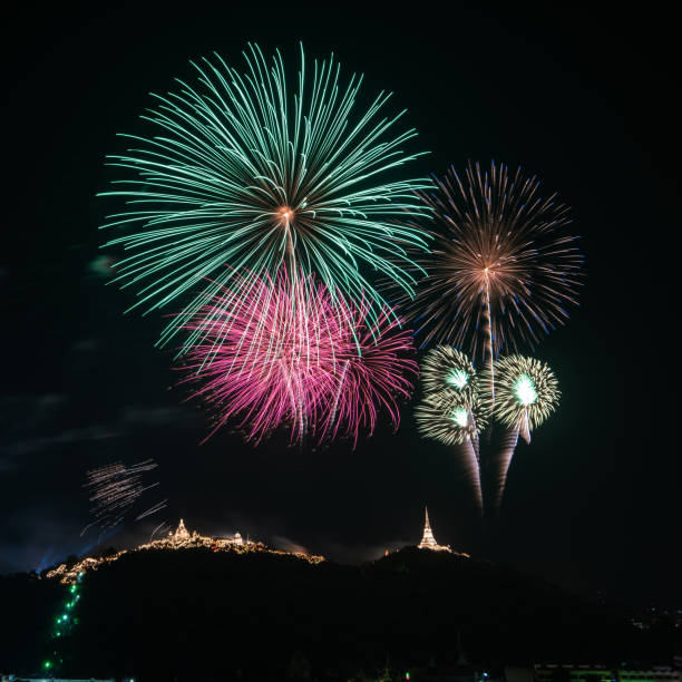 istock Amazing colorful colorful firework display on dark sky for celebration night event 973745694