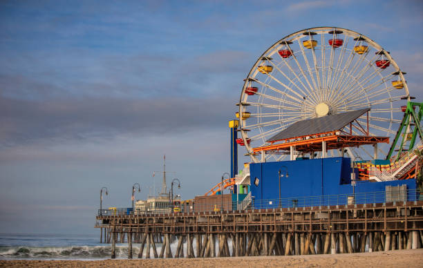 istock santa monica pier during sunset on cloudy day 973746448