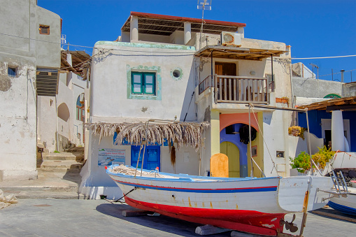 Fishing boats and traditional buildings in Pecorini a Mare, one of the villages of Filicudi island. Filicudi is one of the islands of the Aeolian archipelago.
